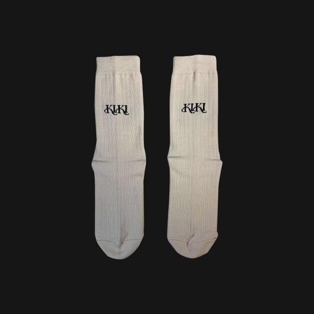 Cream-colored socks KIKI - DEATH OF A DAISY & BIRTH OF AN OYSTER (2025)